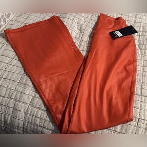 90 degrees faux leather orange flare leggings
